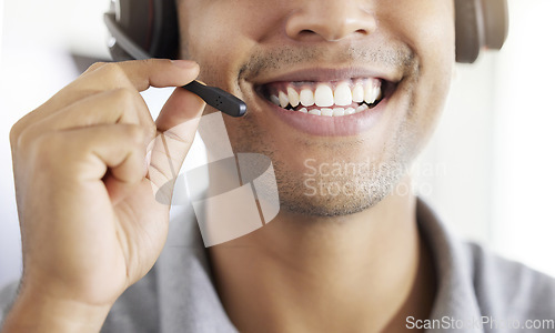 Image of . Friednly call center, customer support or contact us employee working at telemarketing company. Closeup of happy crm worker or receptionist talking in headset in agency office.