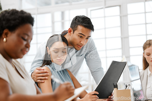 Image of Sexual harassment or inappropriate touch by a businessman on a female employee by putting his hand on her. Unhappy and awkward female coworker feeling uncomfortable due to behavior in the office