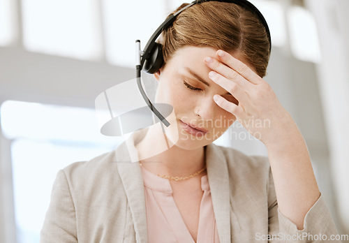 Image of Burnout, headache and stressed call center agent working with problem, bad mental health or stressful job. Female sales representative or advisor feeling overworked, tired and exhausted