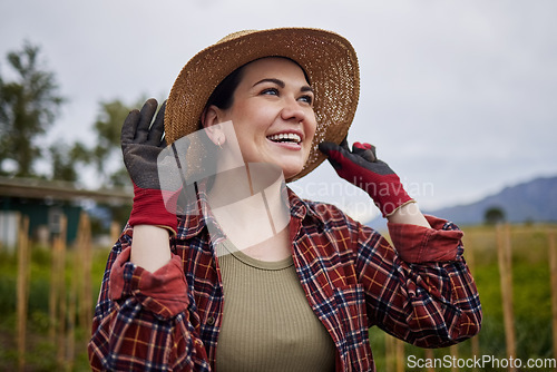 Image of Happy agriculture farmer woman on farm checking clouds sky for outdoor farming, gardening and countryside living. Sustainability worker on a grass field looking at weather with smile for crops growth