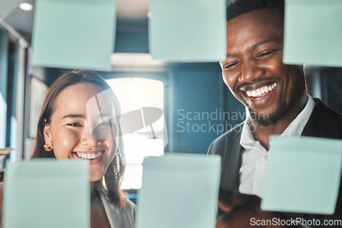 Image of Business people planning ideas in meeting, thinking of marketing strategy and corporate collaboration in office at work. Employees, workers and team writing on sticky notes and paper storyboard