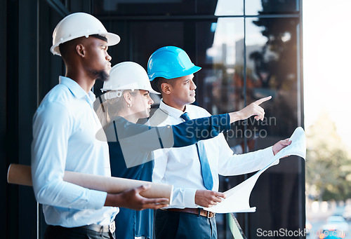 Image of Construction, architecture and management of project planning. Blueprint, design and engineers meeting to discuss work strategy. Professional team, leadership and efficiency on the building site.