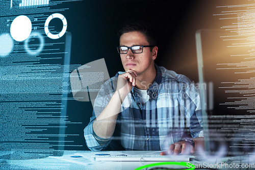 Image of Male IT computer engineer working on a futuristic hologram or cgi screen at his office desk. Tech designer working on technology to test new and innovative data. Web developer work on a digital code