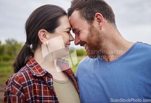 Image of Happy mature couple bonding, laughing and having a romantic, intimate moment outdoors together. Smiling husband and wife showing affection, embracing. Soulmate feeling free, loving their relationship