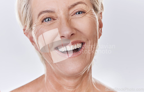 Image of Dentist, veneers or dentures in senior woman mouth or teeth looking happy with her oral hygiene or dental cleaning cosmetic service. Mature model with smile on face for dentistry, health and wellness