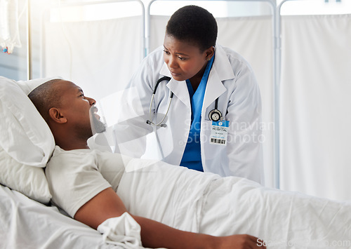 Image of Consulting, hospital plan and healthcare with a sick patient talking to a doctor after cancer diagnosis. Caring health care professional support and explain treatment option to a worried man in bed