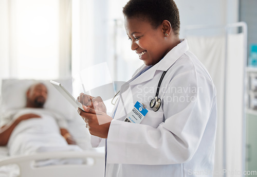 Image of Healthcare, insurance and doctor reading good test results or an exciting email on a digital tablet and feeling positive. Medical worker smiling due news of cure or treatment for her sick patient