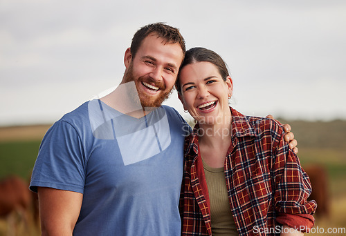 Image of Happy, carefree, and excited farmer couple standing outdoors on cattle or livestock farmland. Portrait of relaxed lovers relaxing on organic or sustainable land smiling and enjoying nature