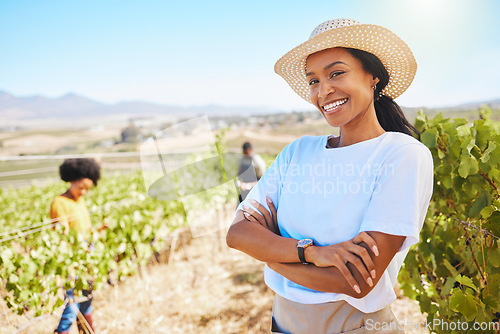 Image of Confident or proud farmer with arms crossed and smile vineyard agriculture field. Young woman on sustainable wine or green fruit farm in summer. Worker happy with growth sustainability on countryside