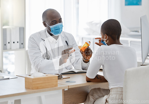 Image of Doctor talking to covid patient of pills or medication in a hospital or clinic. Trust, help and expert advice on healthcare insurance and gp doc consulting with prescription product and face mask