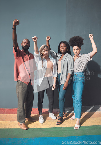 Image of Freedom, power and human rights with a group of young people in protest or demonstration for equality and the LGBTQ community movement. Portrait of a man and women making a stand for gay pride