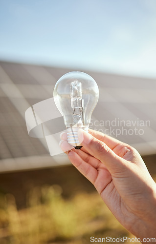 Image of Mockup of hand with light bulb for solar energy in nature, sustainability for green change and clean energy for future environment. Research in sustainable industry and innovation with electricity