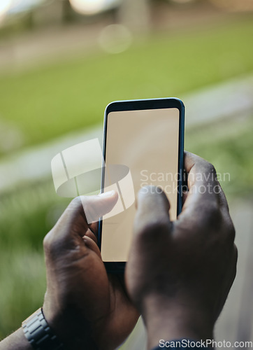 Image of Digital phone and mockup space for screen looking at social media, internet or web content. Hands typing on a mock up display using mobile apps, 5g internet and online communication technology