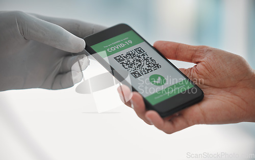 Image of Covid passport, QR code and travel restrictions with a phone in the hands of people waiting in airport. Healthcare, safety and control during the global and international corona virus pandemic