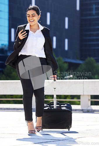 Image of Business woman, travel with luggage and phone for communication with work, internet or web search. Corporate employee going to airport to catch plane for company tradeshow, conference or workshop