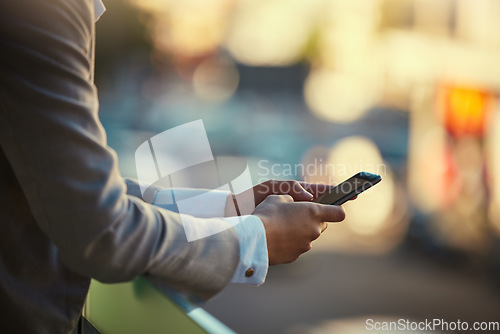 Image of Businessman hands typing on phone outdoors in communication, reading and texting online in urban city bokeh. Man with smartphone or digital mobile device on social media app or internet website