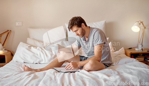 Image of Writing, bed and morning of serious man with coffee and his dairy, calendar or motivation journal. Creative guy writer relaxing in his bedroom house with a positive mindset to start the day at home.