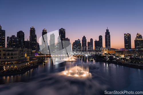 Image of Unique view of Dubai Dancing Fountain show at night.