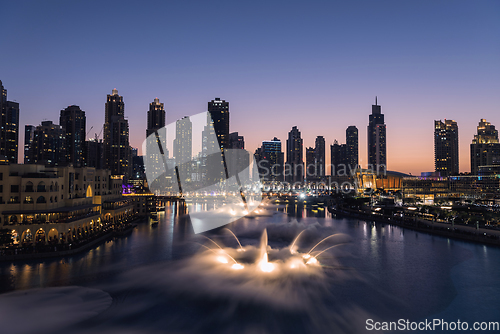 Image of Unique view of Dubai Dancing Fountain show at night.