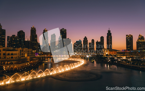 Image of Unique view of Dubai Dancing Fountain show at night.