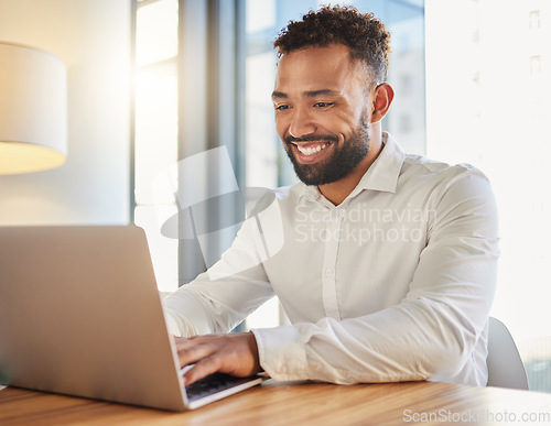 Image of Happy business manager on laptop typing an email announcement for success or project management strategy online in office. Corporate professional smile for new website design at company startup