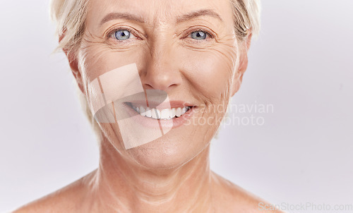 Image of Portrait of a happy senior womans face against studio mockup background. Healthy and natural mature model with smooth skin. Feeling radiant and fresh with her healthcare or skincare cosmetic routine