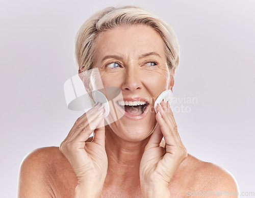 Image of Senior woman skincare and face with product remover and makeup cleaning or beauty model with cosmetic cotton pads on studio mockup background. Happy woman face, headshot and wrinkles or skin care