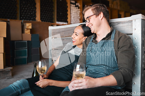 Image of Laughing friends, wine tasting and couple with happy smile bonding on countryside farm with drink glass. Interracial man, woman or industry worker people in environment vineyard restaurant distillery