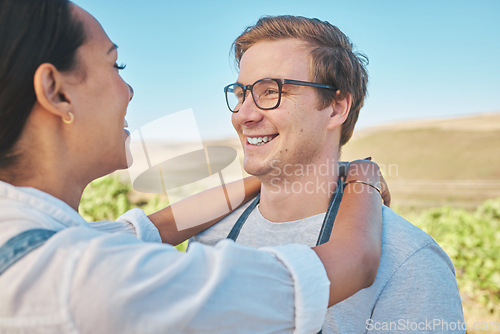 Image of Happy, couple love and smile on farm man and woman loving and bond together on wine field and agriculture. Interracial, green and vineyard male and female travel to holiday vacation trip in summer
