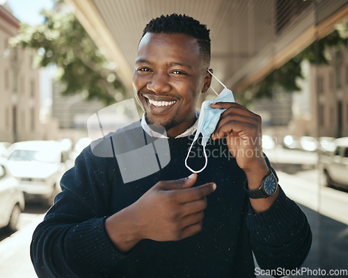 Image of Post covid travel, working businessman with mask in city after lockdown restrictions and pandemic. African worker travel, closeup portrait employee smiling and change covid19 job safety regulations.