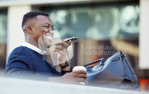 Image of Happy black man talking on phone, travel for business in a city, sitting outside while using tech to communicate. Carefree African American planning, asking Siri assistance, voice to text audio memo