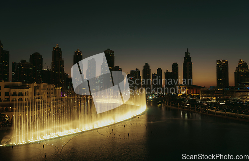 Image of Unique view of Dubai Dancing Fountain show at night.