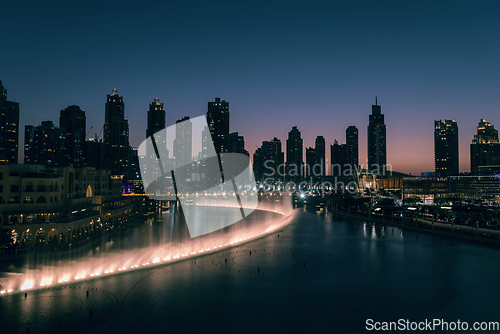 Image of Unique view of Dubai Dancing Fountain show at night.