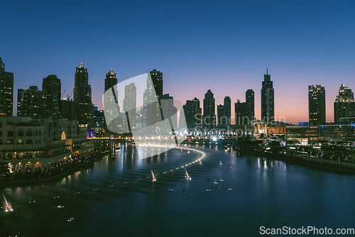 Image of Unique view of Dubai Dancing Fountain show at night.