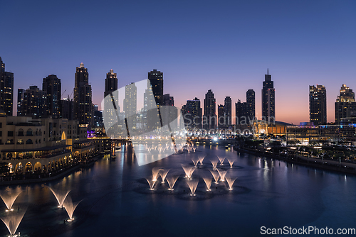 Image of Unique view of Dubai Dancing Fountain show at night.