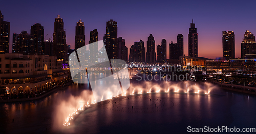 Image of Unique view of Dubai Dancing Fountain show at night.