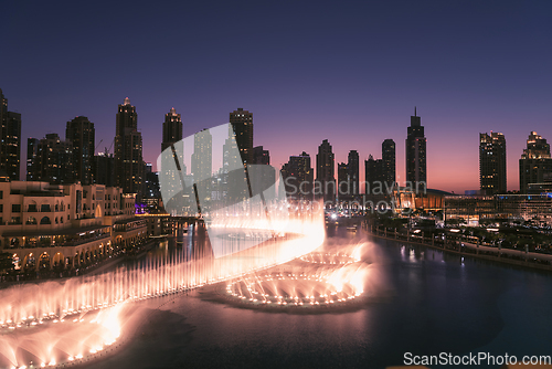 Image of Unique view of Dubai Dancing Fountain show at night.