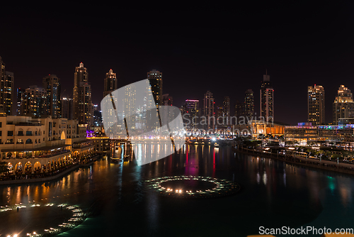 Image of Unique view of Dubai Dancing Fountain show at night.