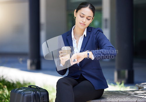 Image of Time, travel and schedule with business woman looking at watch fo deadline, check the hour for traveling, an appointment or meeting. Discipline, timing and city entrepreneur to start the day