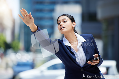 Image of Business woman stop to call uber, taxi or cab in road for travel, transport and commute to work destination. Young corporate, professional entrepreneur and worker taking a trip in urban city street