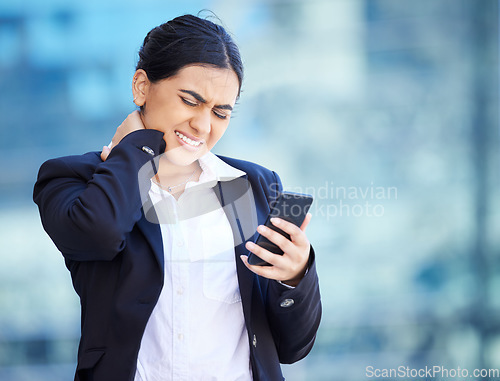 Image of Headache, injury and neck pain while texting, business woman suffering from hurt spine and poor posture. Female entrepreneur holding head while reading a text, upset by bad news or negative feedback