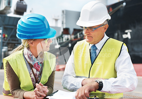 Image of Dock worker, shipping and cargo delivery industry workers in safety gear working on logistics papers of the transportation. Supply chain, administration and managers in collaboration and conversation