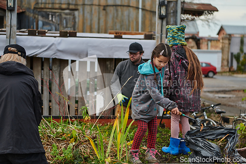 Image of A modern family parents and children, is working together to beautify their front yard with flowers in preparation for the upcoming holiday season.