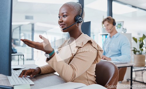 Image of Call center, customer service and support with an agent working to help on a call online in her office. Contact us, telemarketing and consulting with a consultant in a headset giving helpful advice