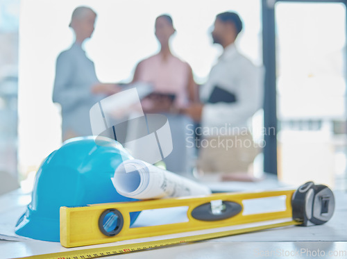 Image of Equipment or architecture tools in an office of engineers planning during a meeting in a boardroom. Drawing or blueprint project on a workplace desk or table for construction design