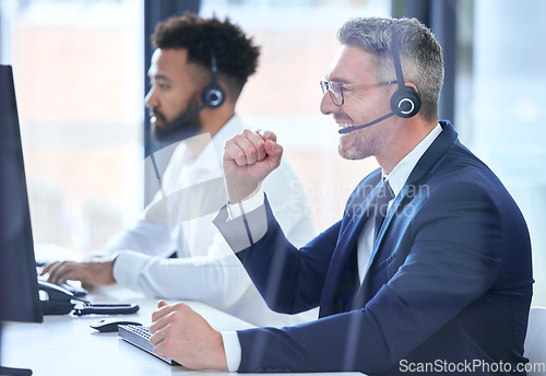 Image of Winner, finance and financial trader happy with stock market success and celebrate winning with a smile at his pc desk. Fintech, economy and global news of investment analytics with prices in profits