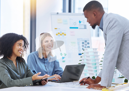 Image of Team, design and architecture of a group of architect people working on a site plan or strategy with laptop and digital tablet. Business contractors in teamwork, planning and paper design layout.