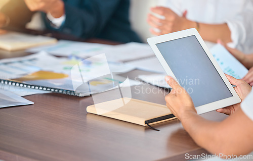 Image of Tablet, business meeting and mock up screen at corporate office desk with investors or team. Management, notes and analytics data report on digital technology for conference or presentation.