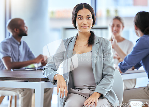 Image of Business woman, office worker and employee working with motivation, smile and career success in a startup company with team of staff. Portrait of a happy, content and young professional in an agency