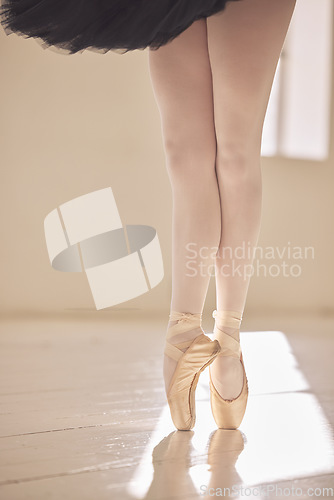 Image of Ballet, feet and shoes of a ballerina or dancer dancing or training for a performance in a studio. Legs and toes of skilled and talented elegant performer practicing or rehearsal in an art school